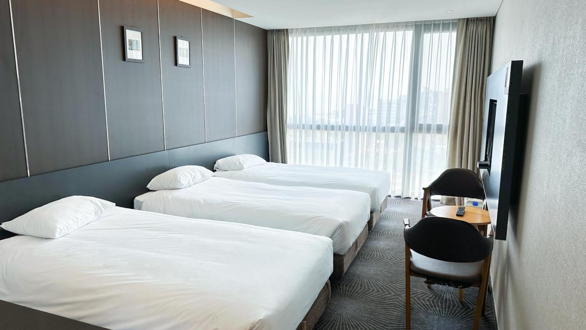 Golden Daisy Hotel Seogwipo-stad Buitenkant foto