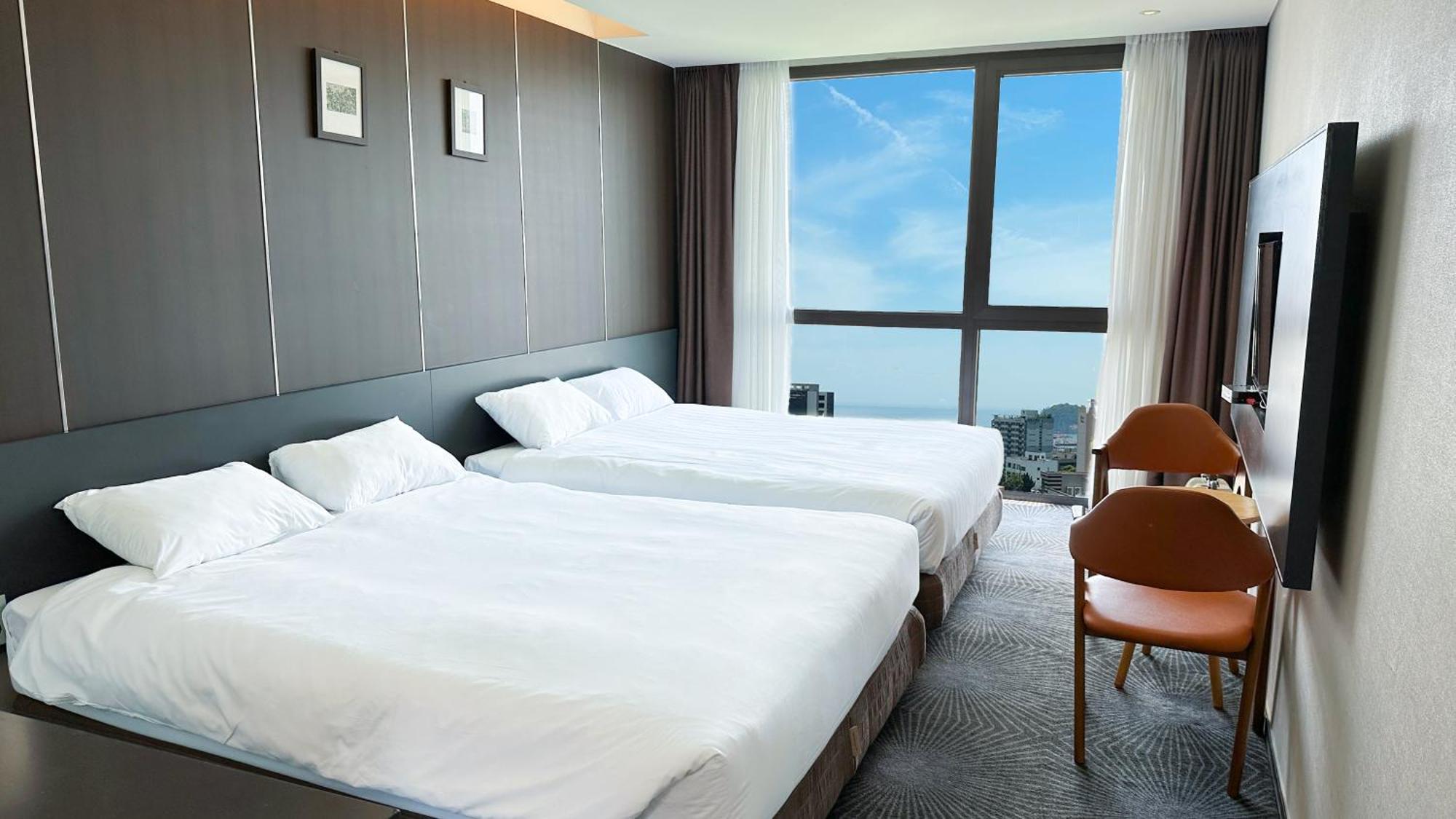 Golden Daisy Hotel Seogwipo-stad Buitenkant foto