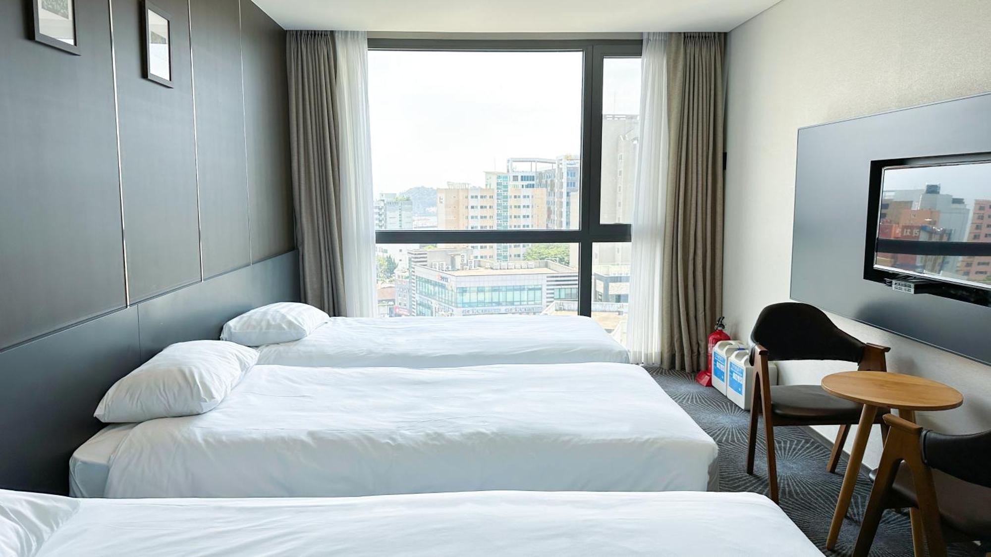 Golden Daisy Hotel Seogwipo-stad Buitenkant foto